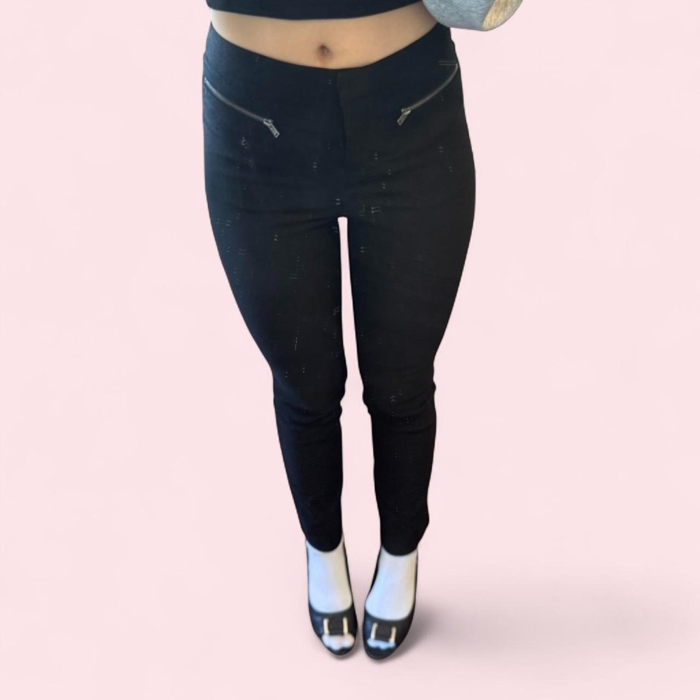 Black skinny jeans with edgy silver zipper